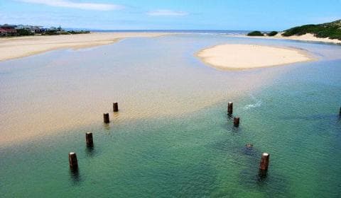 Klein Brak River mouth and lagoon with sandbanks meeting the sea